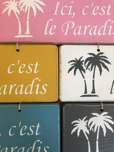 Pancarte:" Ici c'est le paradis".